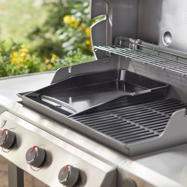 Piastra in ghisa smaltata con sistema di raccolta del grasso compatibile con tutti i barbecue a gas della serie Genesis II.